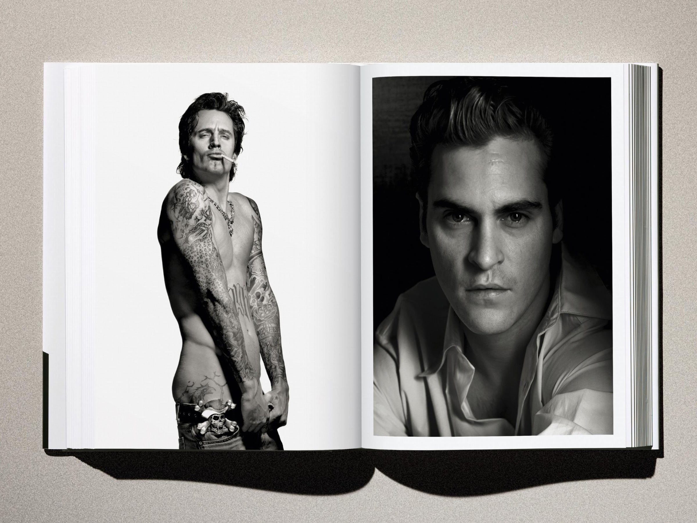 Two page spread from Albert Watson Kaos: left shows a tattooed shirtless man with cigarette, right a close portrait of a man.