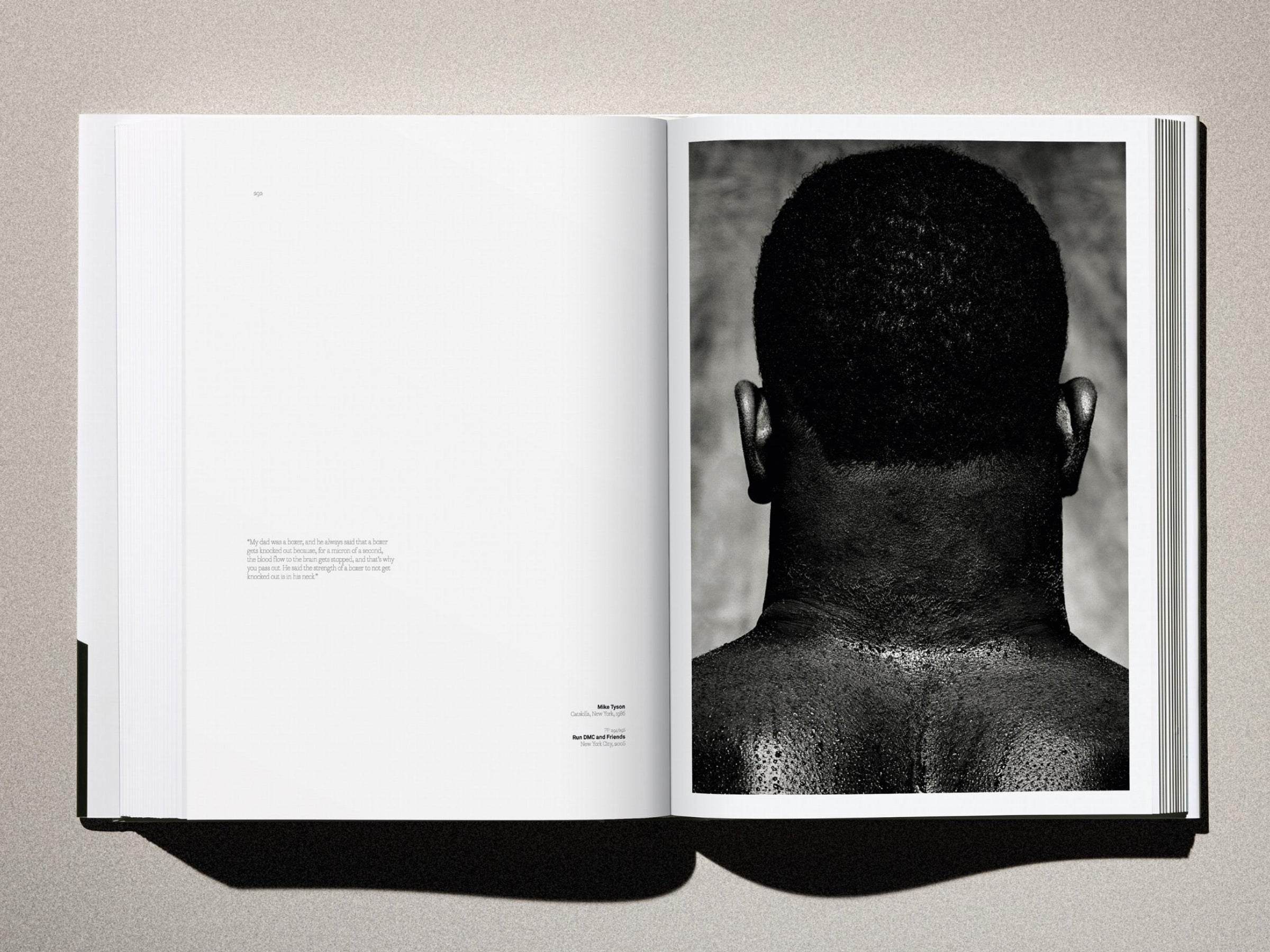 Two-page spread from Albert Watson Kaos showing a close-up back of a man's head in black and white on the right page.