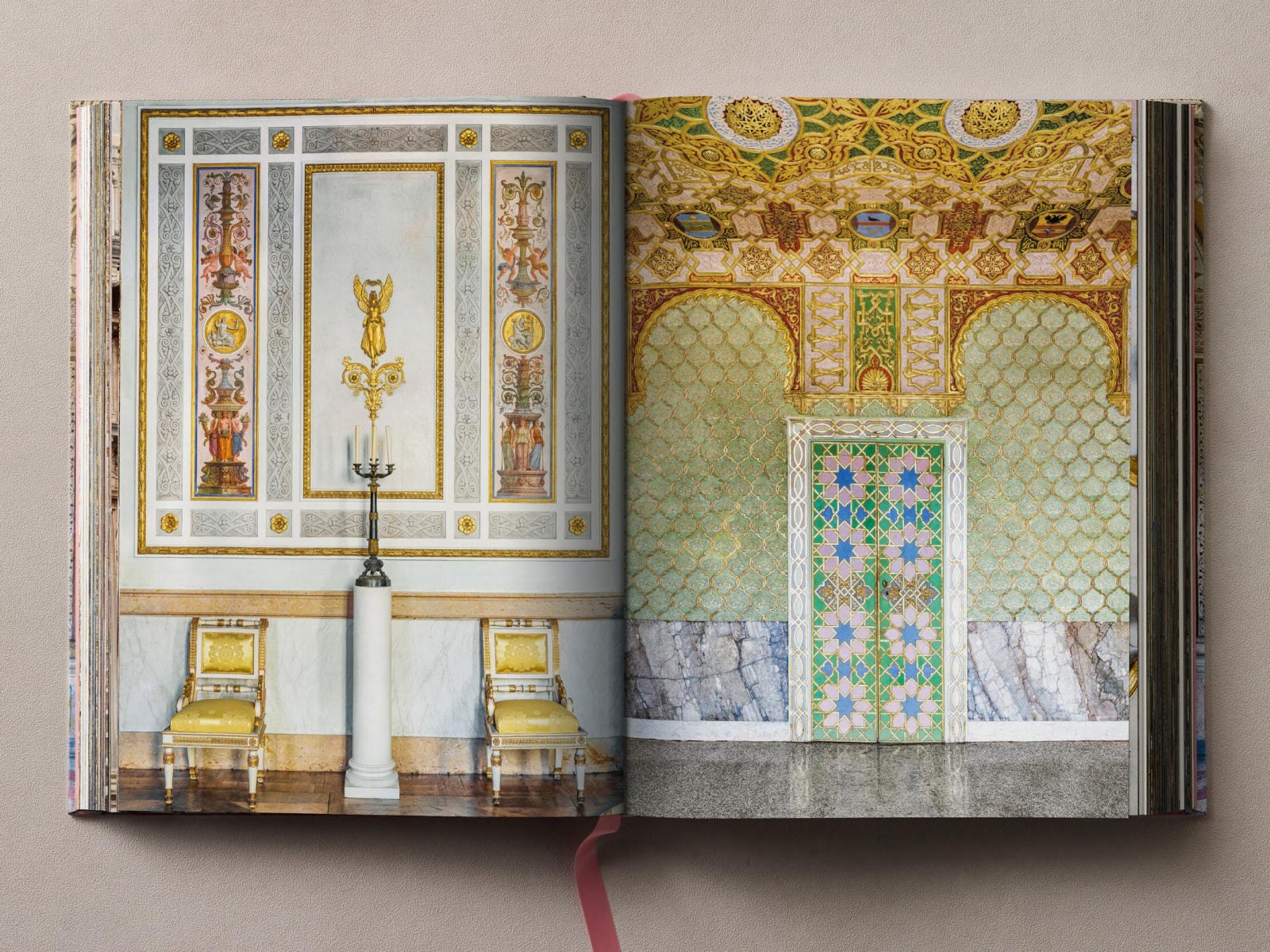 Opulent palace interior with gilded wall panels, a marble pedestal, and gold upholstered chairs.