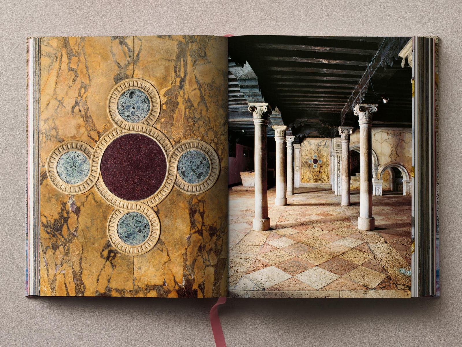 Spread from Massimo Listri Italian Palaces showing a marble rosette on the left and a columned hall with a checkered floor on the right.