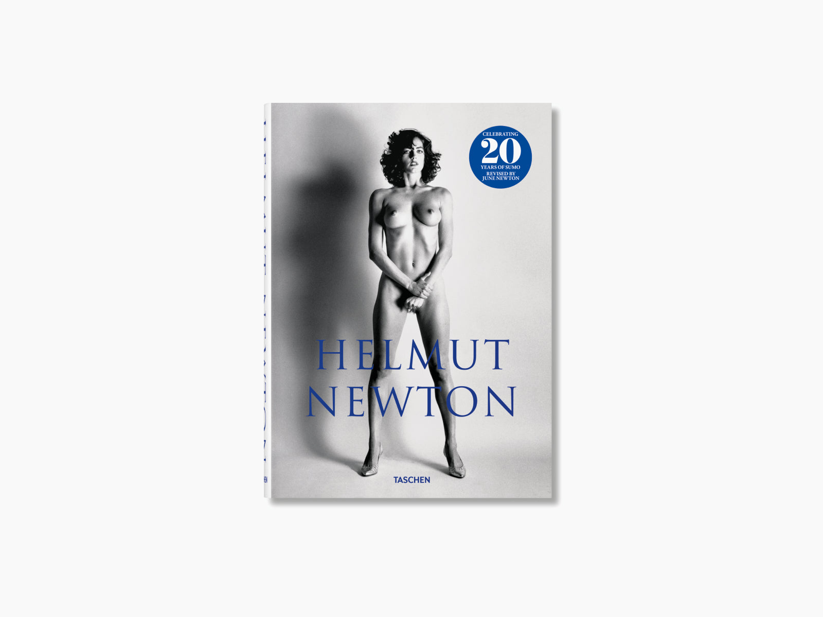 Helmut Newton SUMO edition cover displaying a full length nude photograph and blue HELMUT NEWTON typography.