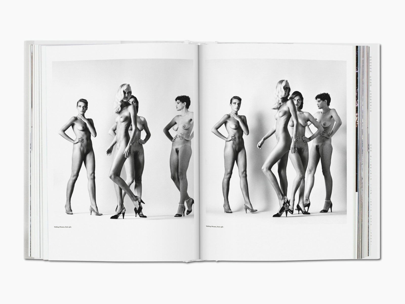 Spread from Helmut Newton SUMO showing five nude women posed in high heels against a white backdrop.