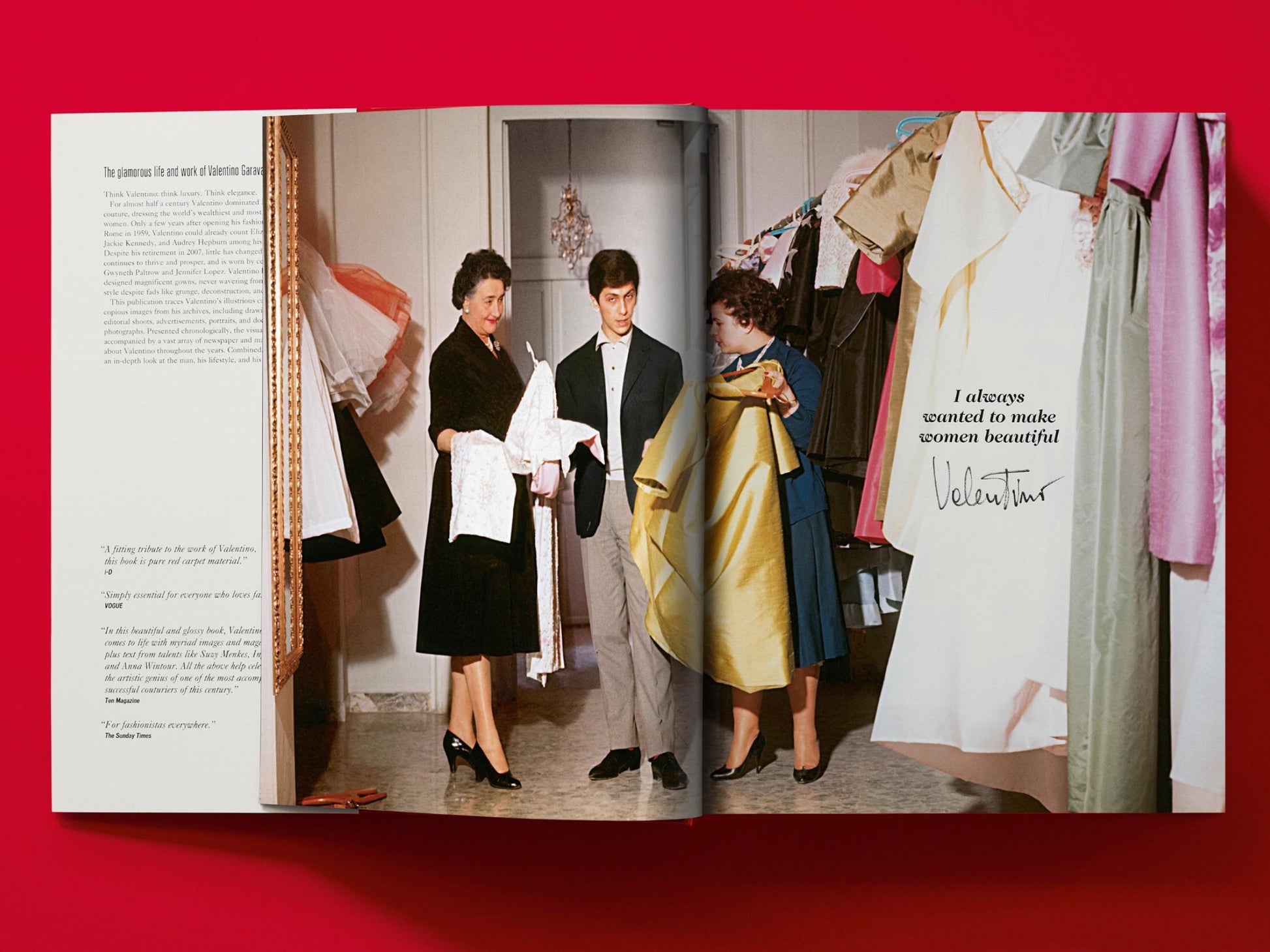 Gloved hand turning a page in a Valentino book spread showing a design studio with colorful gowns on racks.