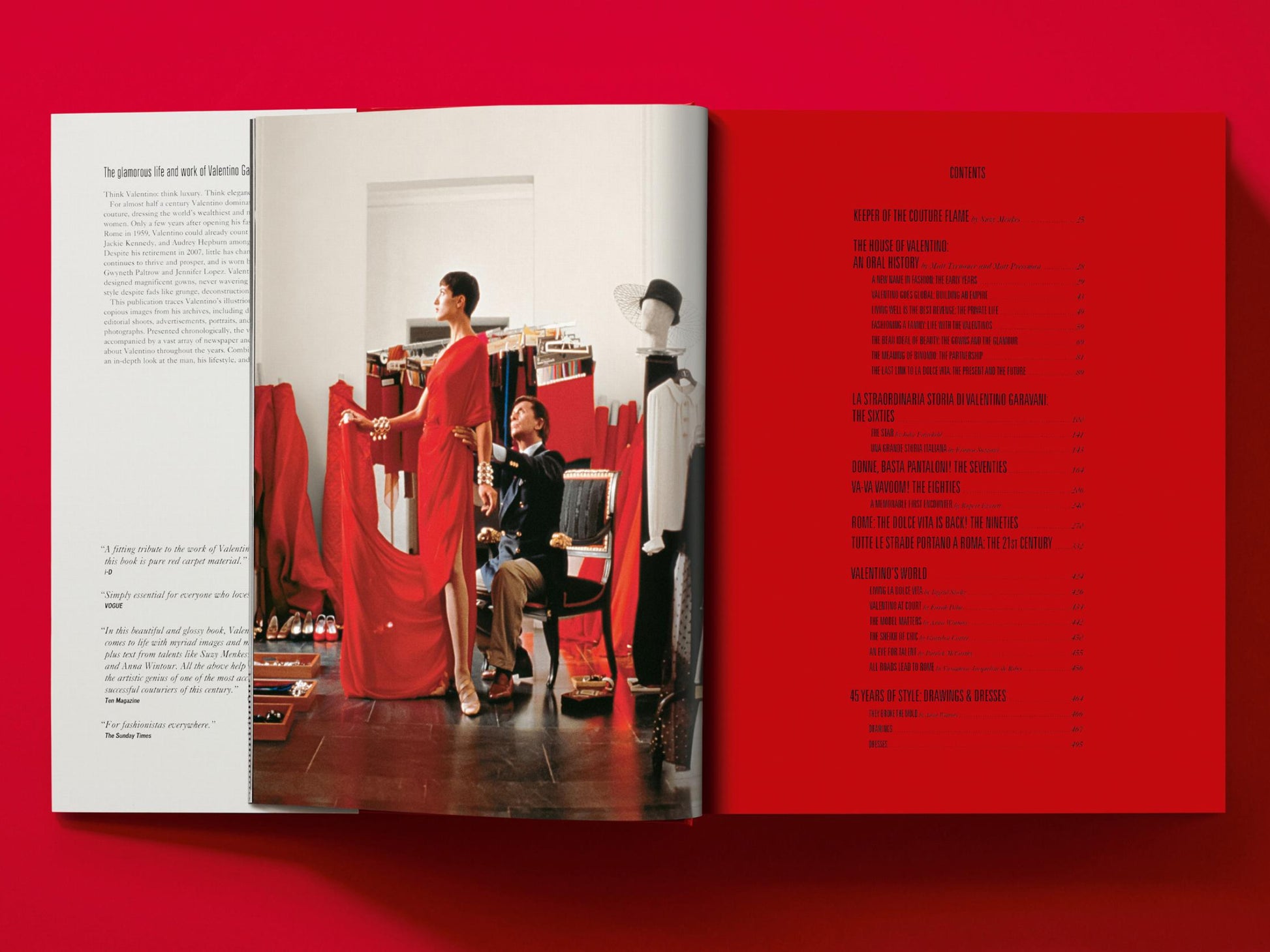 Spread from Valentino A Grand Italian Epic showing a model in a red gown being fitted by staff with clothing racks nearby.
