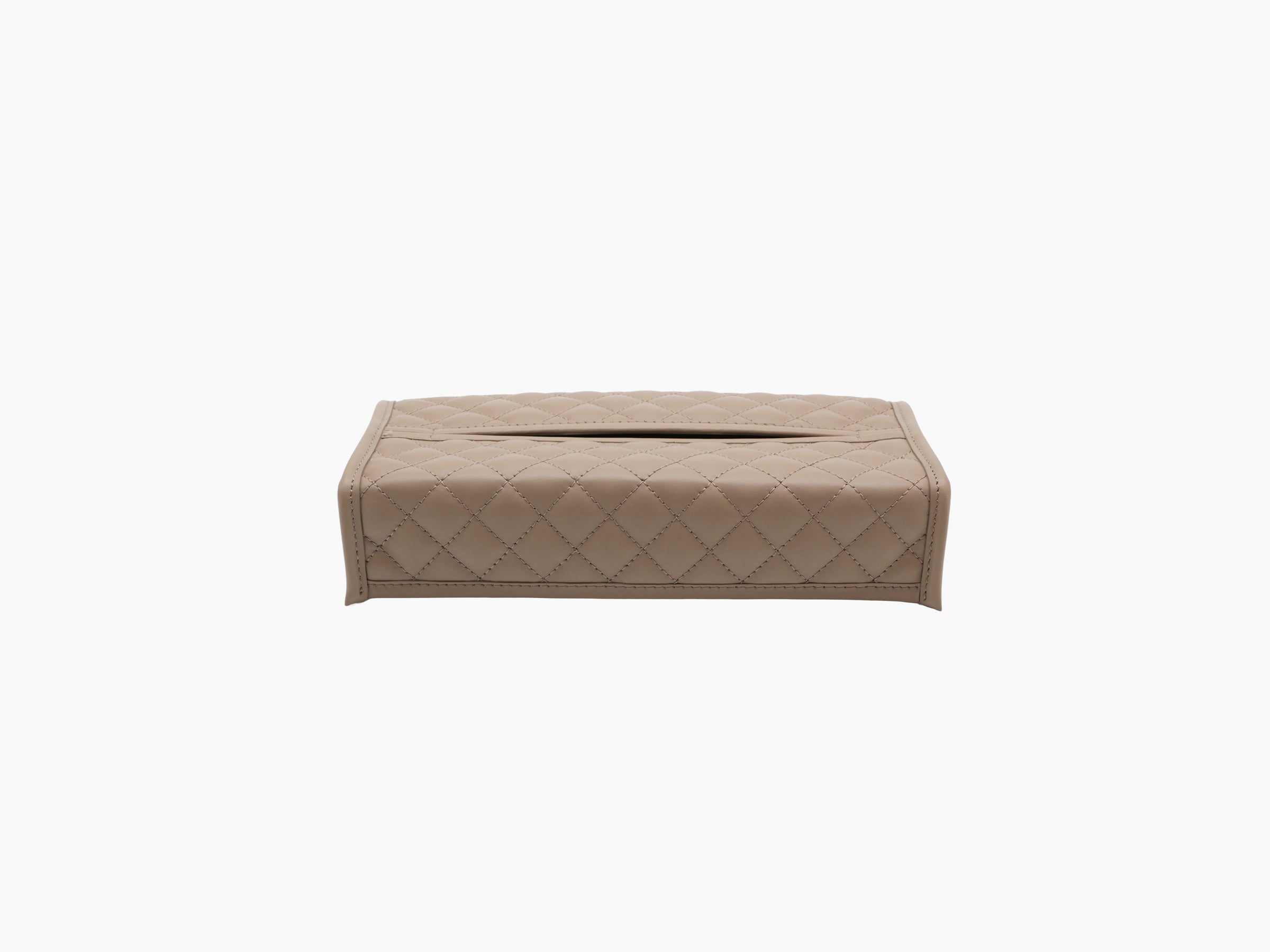 Beige quilted leather tissue box cover viewed from the side with a visible top slot and RIVIERE made in italy stamp