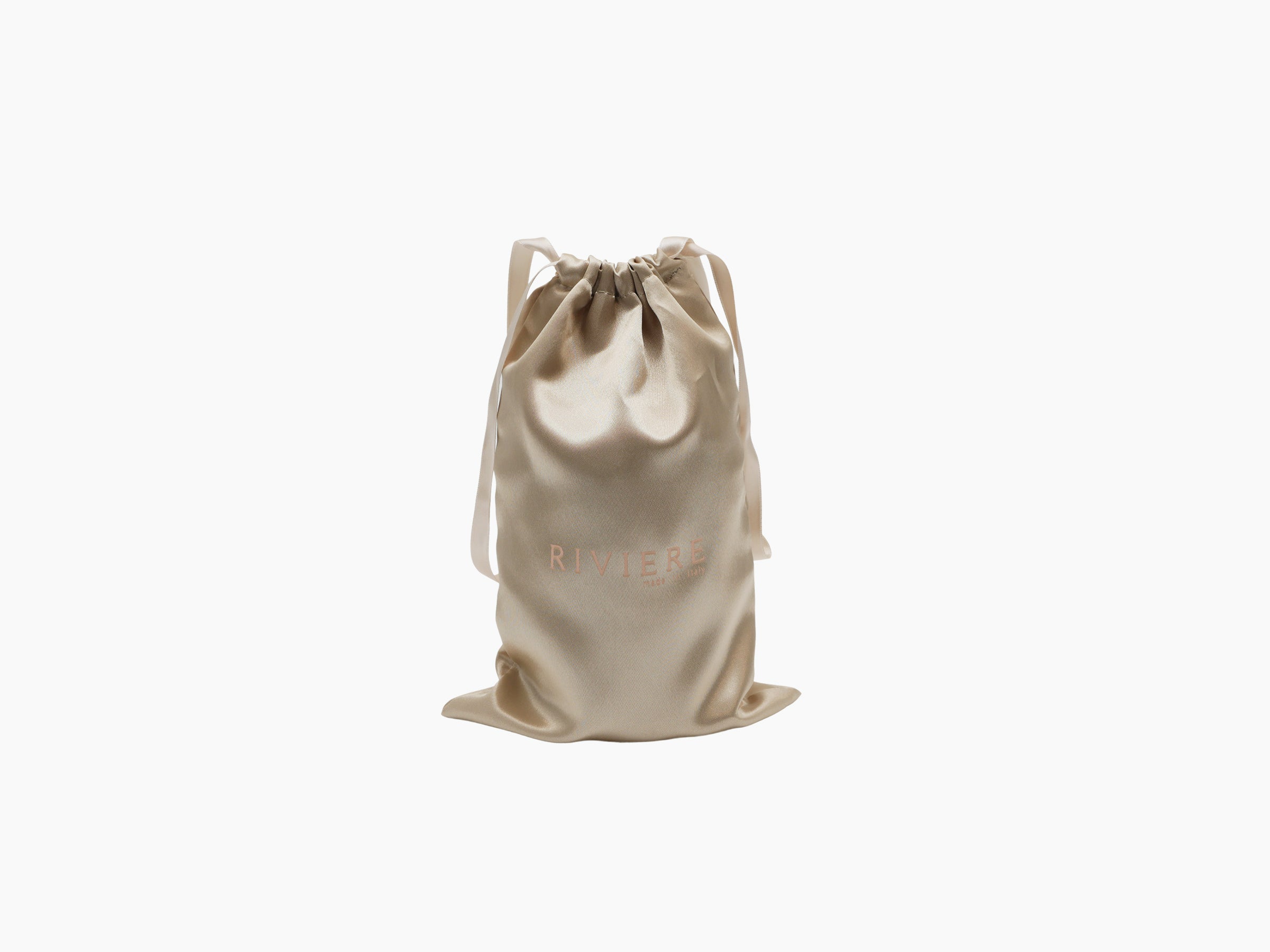Beige satin drawstring pouch with RIVIERE logo beside a matching gift box