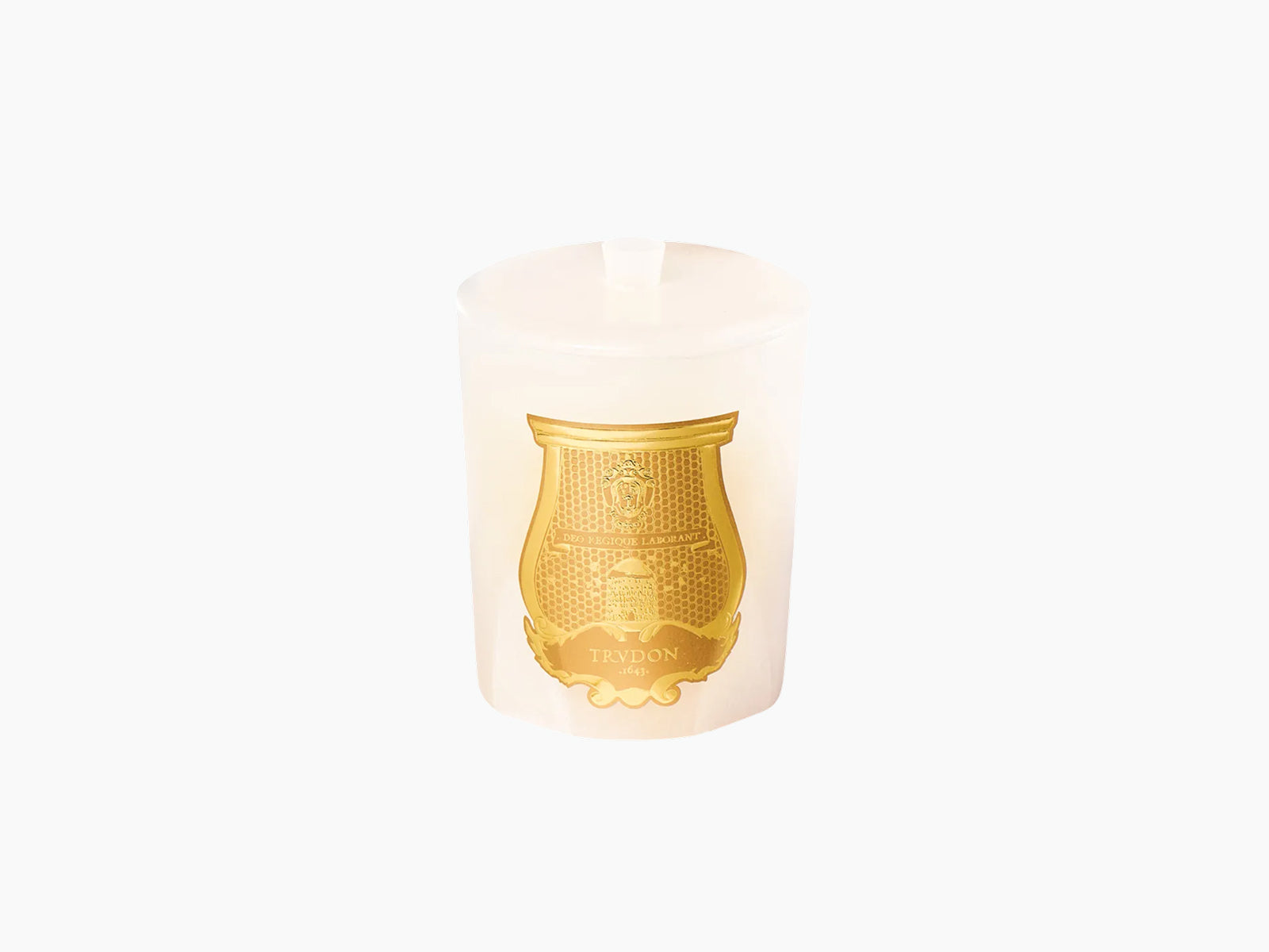 Gabriel white alabaster candle holder with a gold emblem and matching lid.