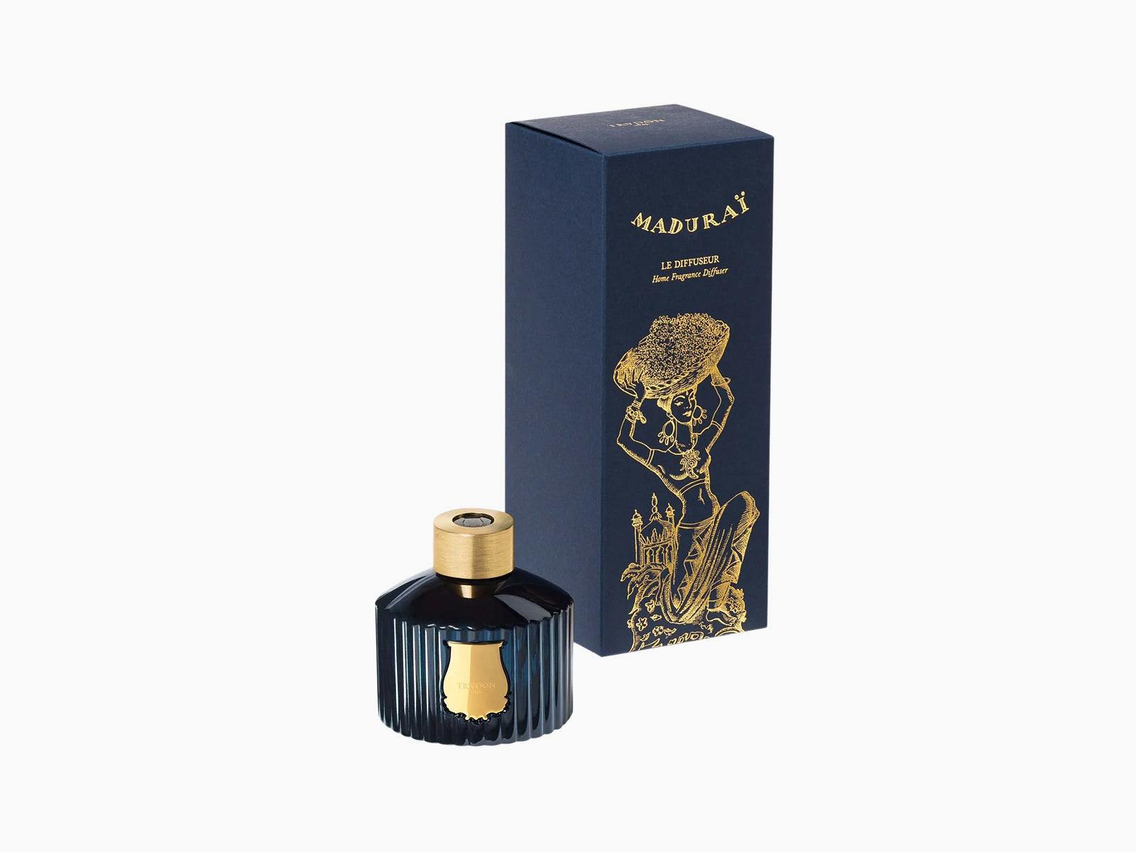 Maduraï diffuser in blue ribbed glass with gold cap beside its navy box featuring a gold illustration.