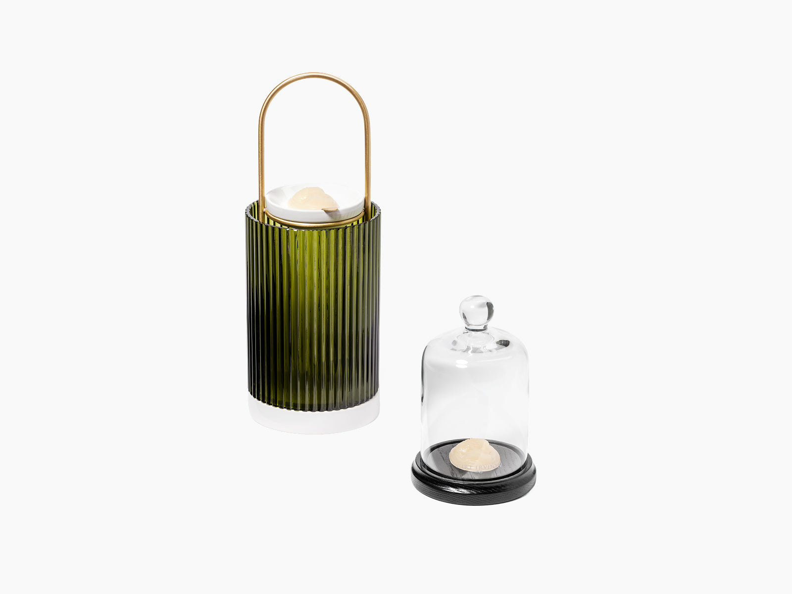 La Promeneuse set with green ribbed diffuser and glass cloche over a scented cameo