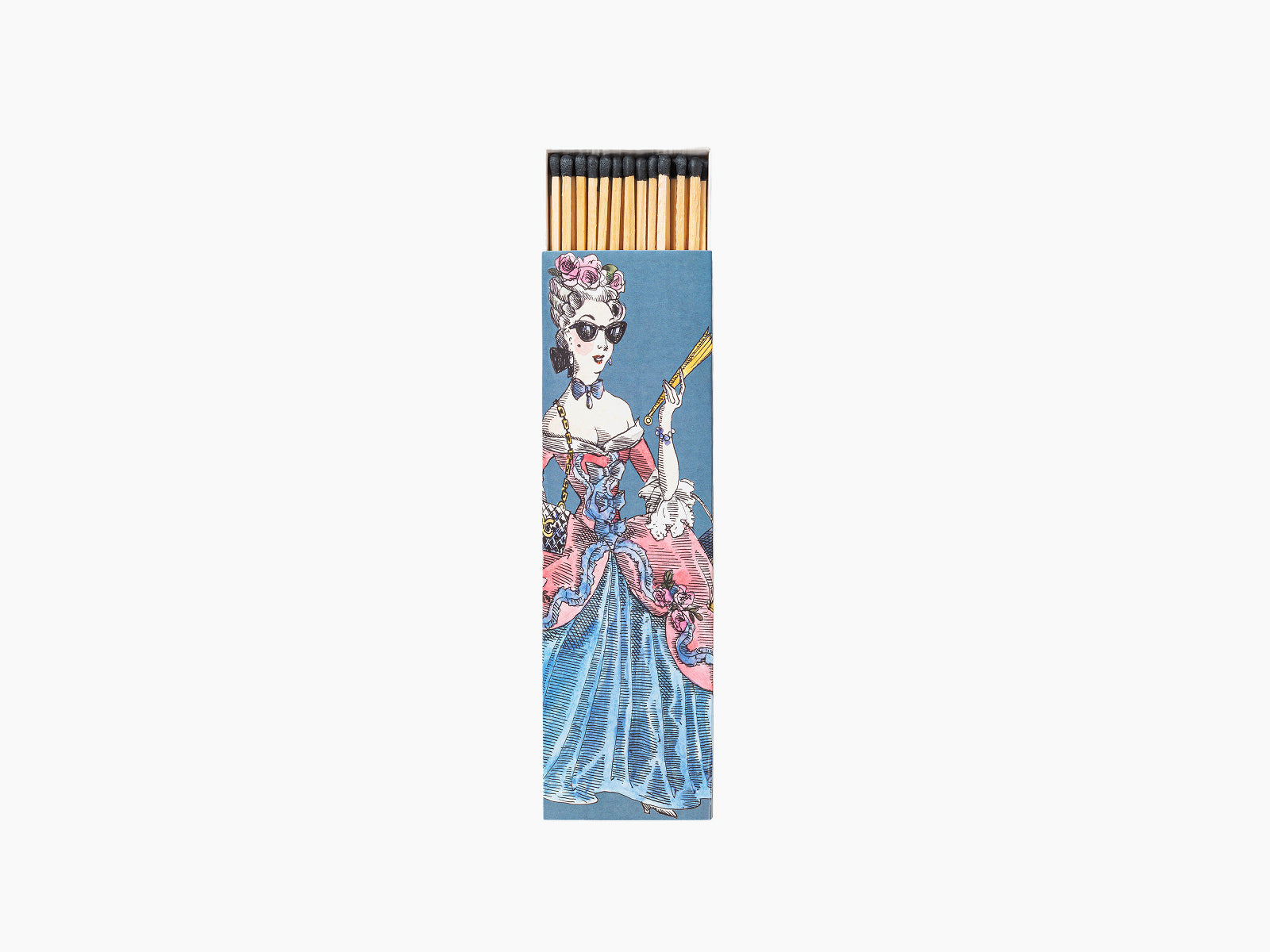 Ernesto scented matches in a blue illustrated box featuring a fashionable woman in a blue gown