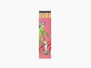 Scendes Matches Ernesto Viscounts and Viscountesses depicted on a pink box with a chic woman in green and purple beside a bicycle