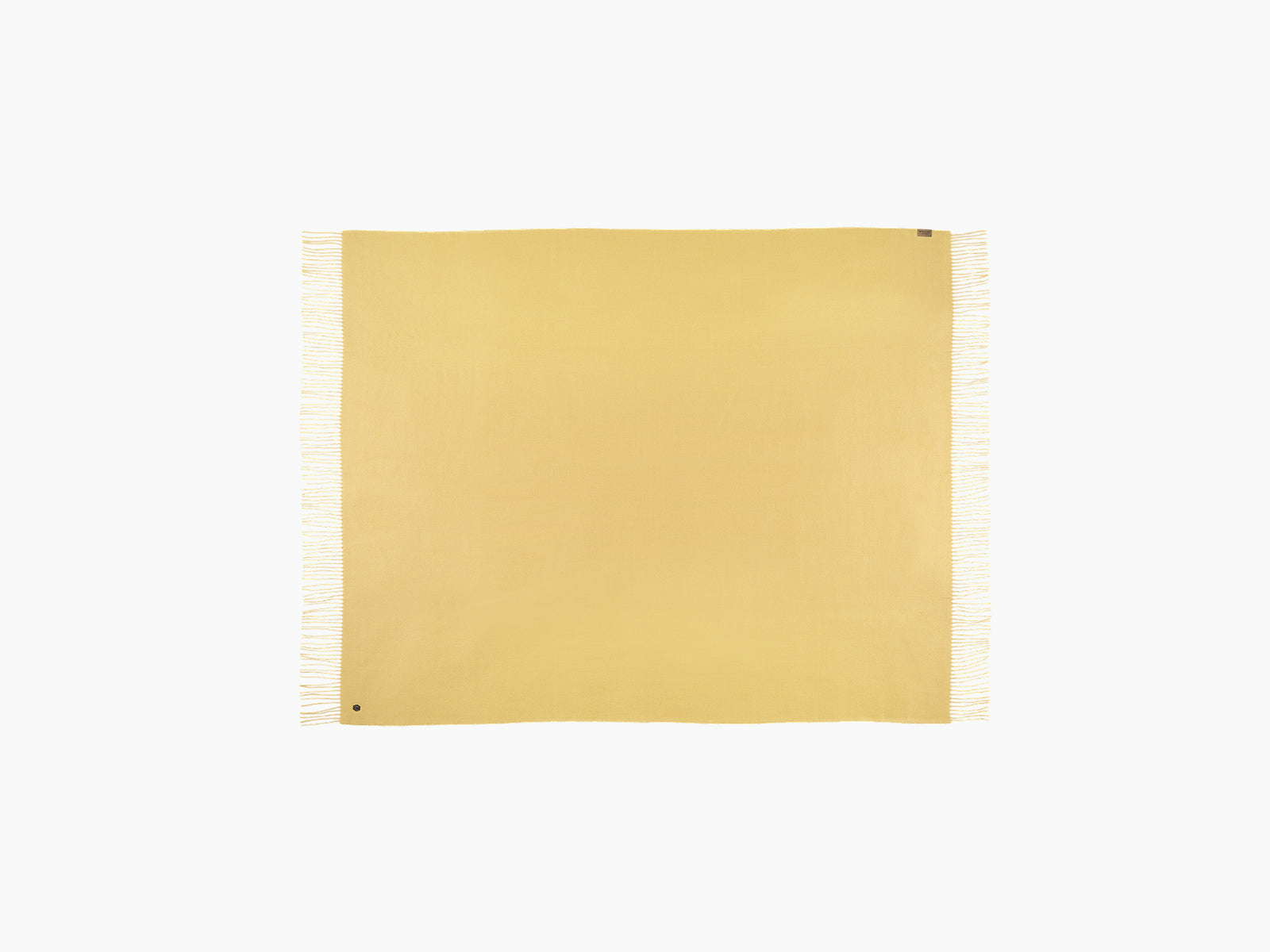 Golden yellow Plaid ALMA alpaca blanket with fringed edges laid flat