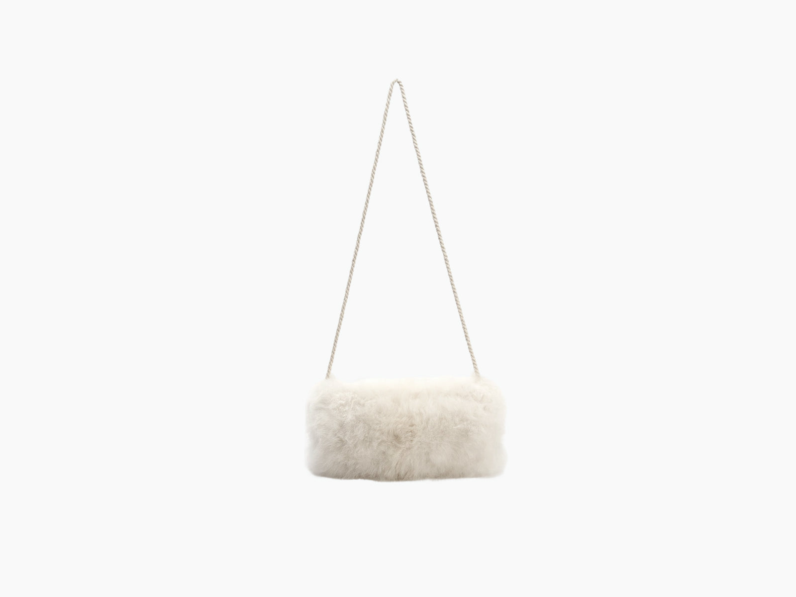 Ivory alpaca pocket muff with rope strap against a plain background