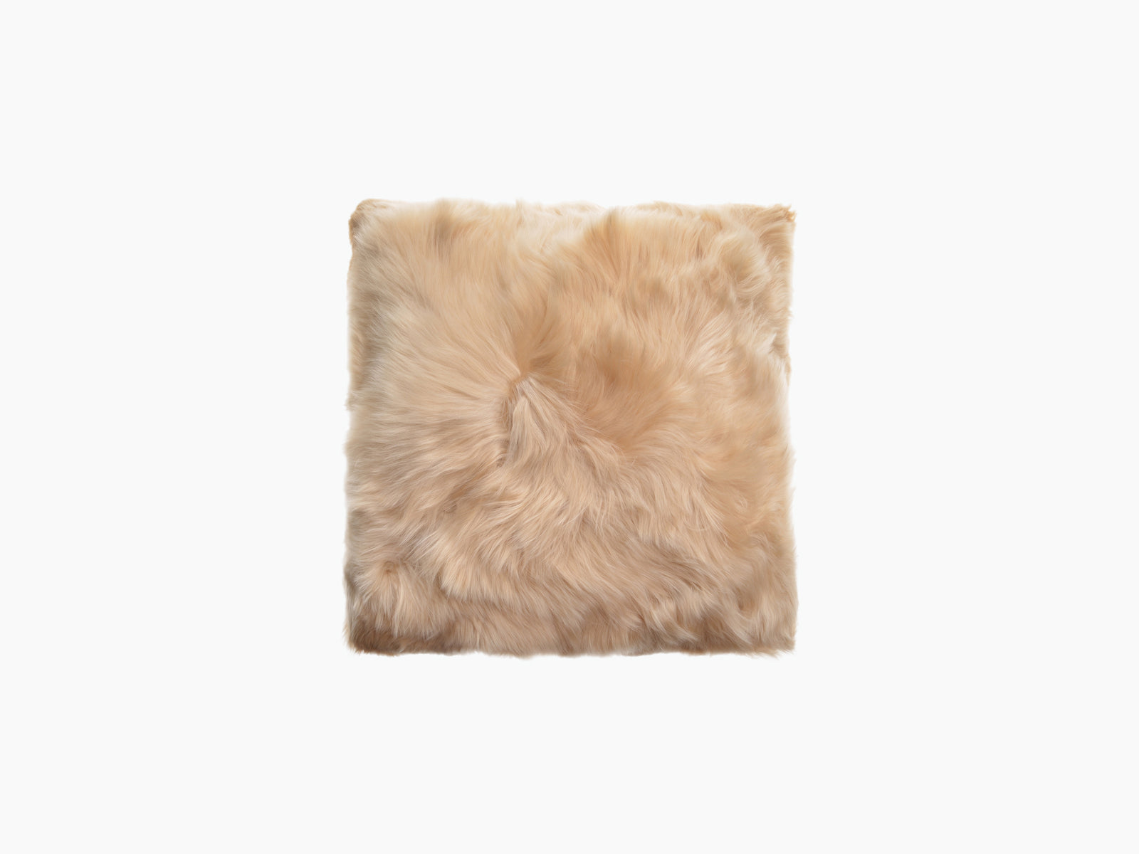 Beige square alpaca cushion with plush fur texture on white background