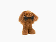 MILO rabbit plush made of alpaca fiber with a black bow tie on a plain white background