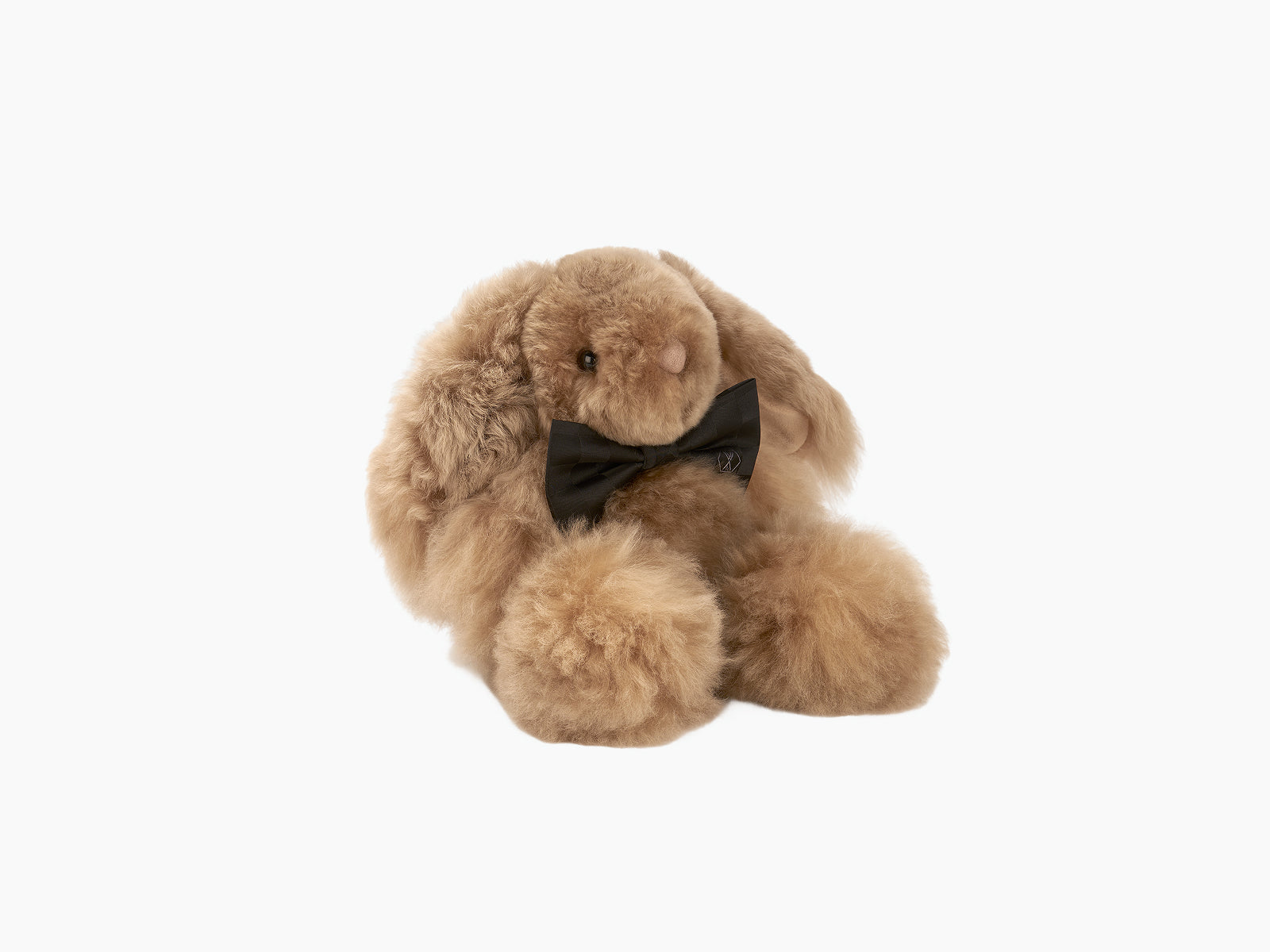Tan Milo rabbit plush with black bow tie soft alpaca fibre