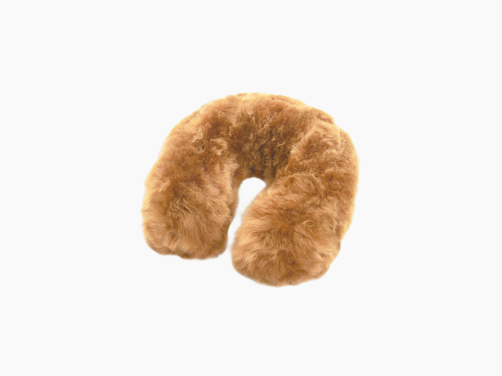 Camel brown fluffy U-shaped travel pillow with soft fur and a small front tag