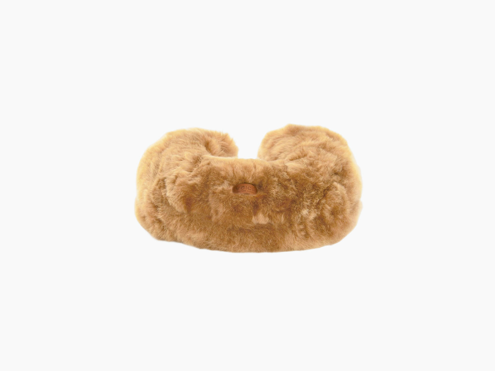 Camel brown fluffy U-shaped travel pillow viewed from the front with plush fur