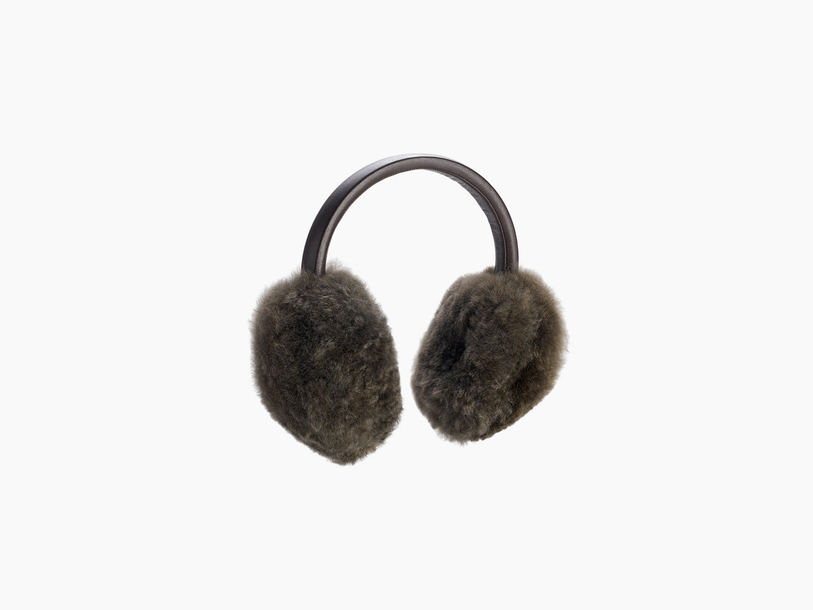 Front view of fluffy dark brown alpaca ear warmers with a leather headband on white background