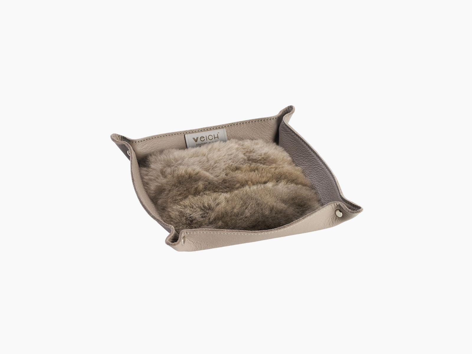 Small beige leather catchall tray with plush alpaca lining, branded WEICH, for jewelry and daily essentials